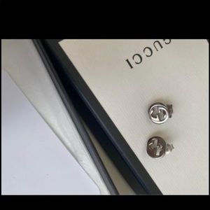 Gucci Silver Interlocking Stud Earrings